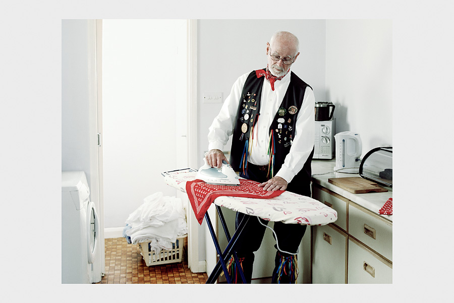 Jon Day Photography. Morris dancer doing chores.