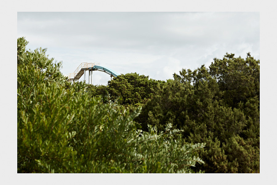 Jon Day Photography. Water slide and bushes.